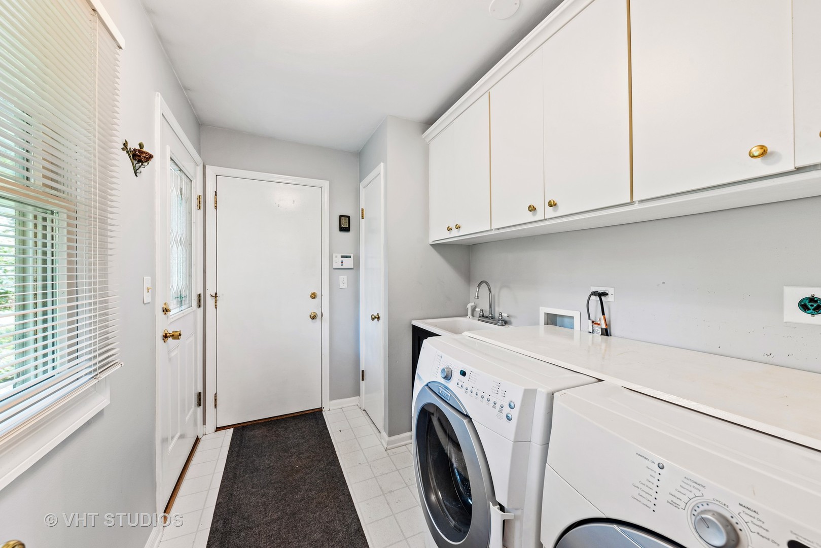 6 Oak Creek Road Rolling Meadows, IL 60008 - Photo 27 of 42 a utility room with dryer and washer