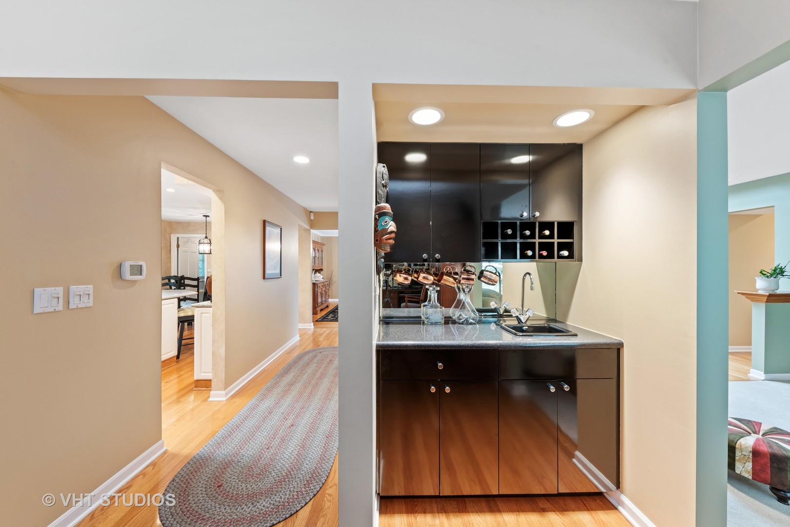 6 Oak Creek Road Rolling Meadows, IL 60008 - Photo 9 of 42 a view of living room and kitchen with wooden floor