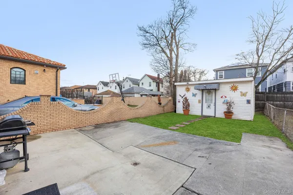 a view of a backyard with a garden and plants