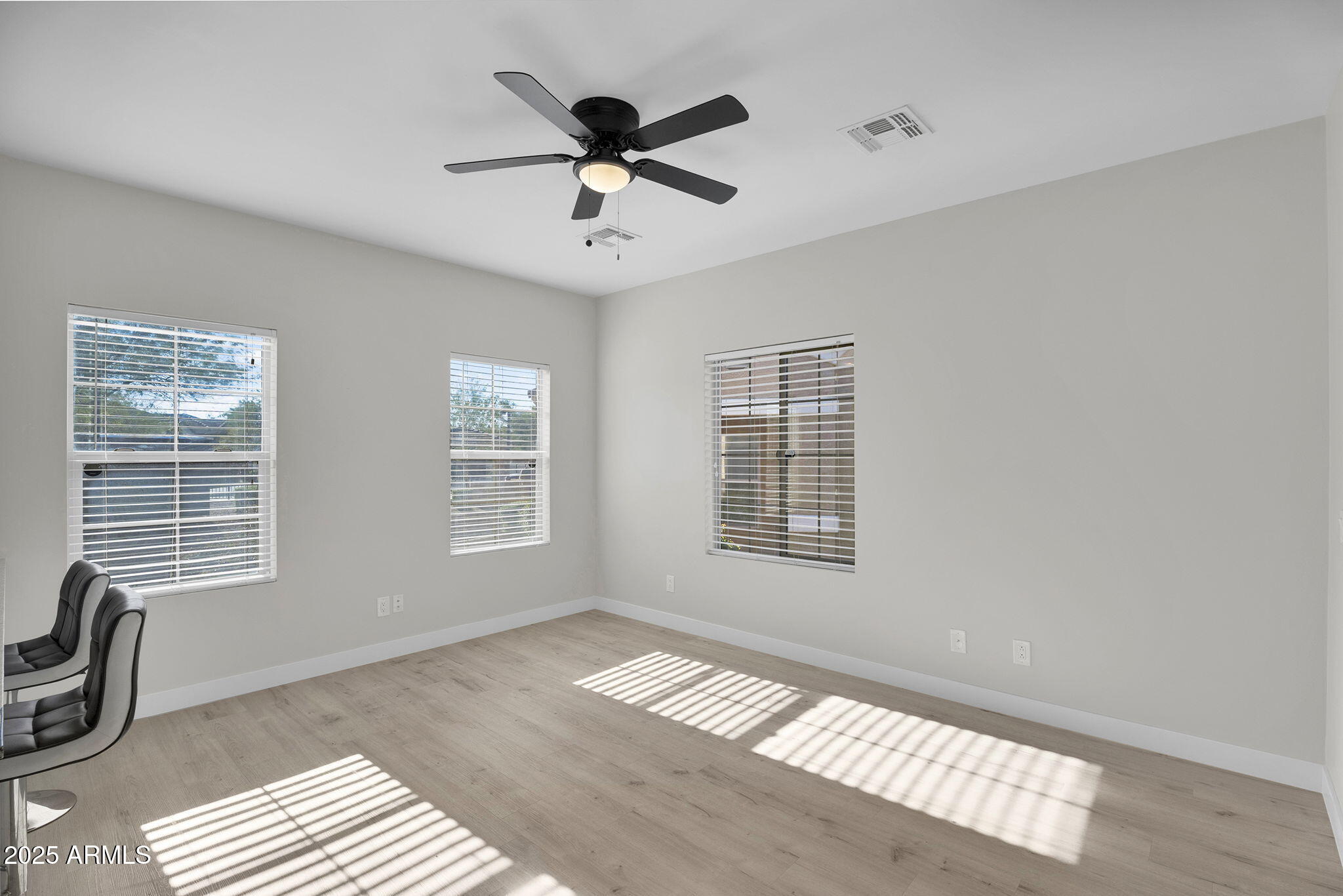 854 South San Marcos Drive, Unit 7C Apache Junction, AZ 85120 - Photo 10 of 48 a view of a livingroom with a window and wooden floor
