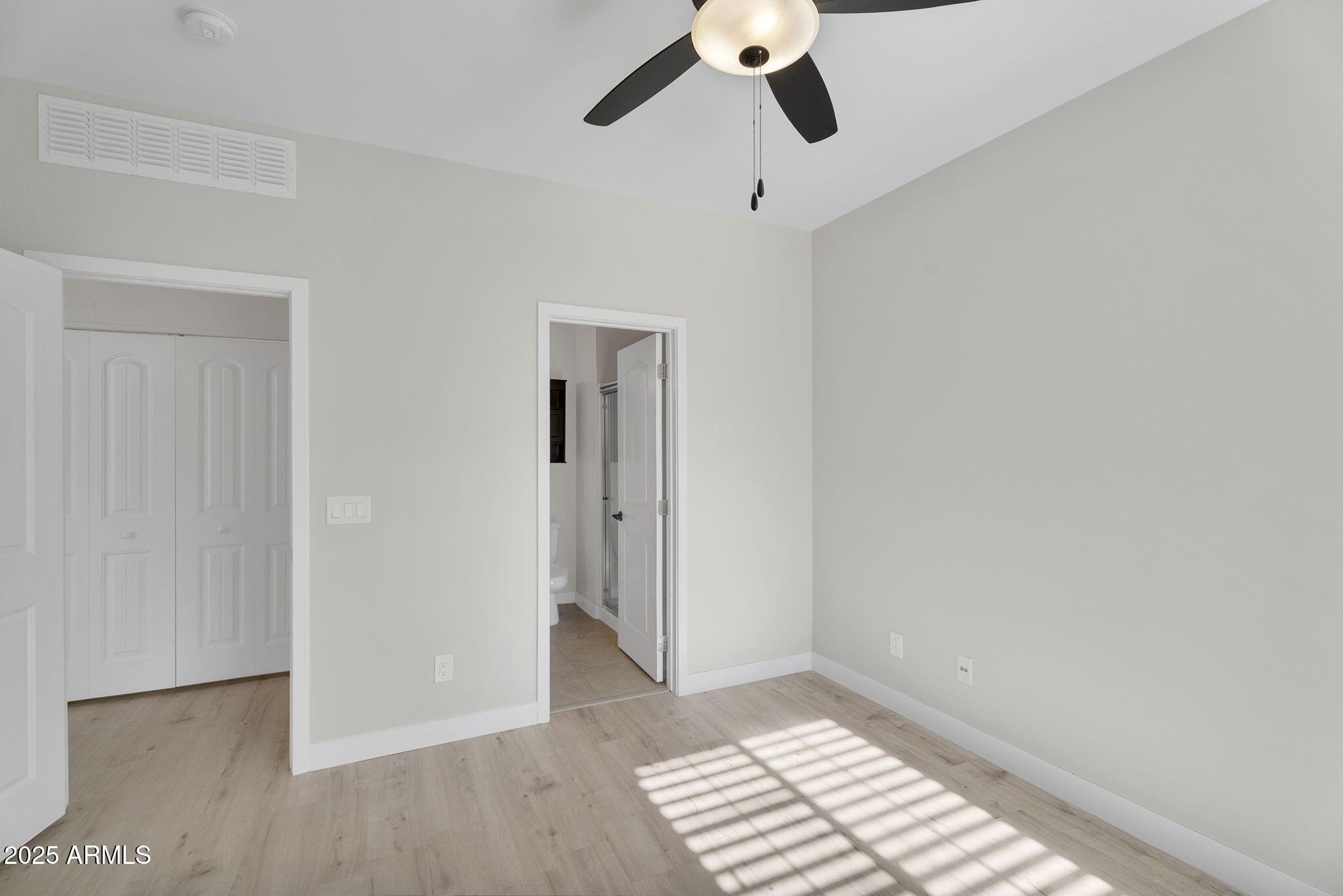 854 South San Marcos Drive, Unit 7C Apache Junction, AZ 85120 - Photo 14 of 48 wooden floor in an empty room