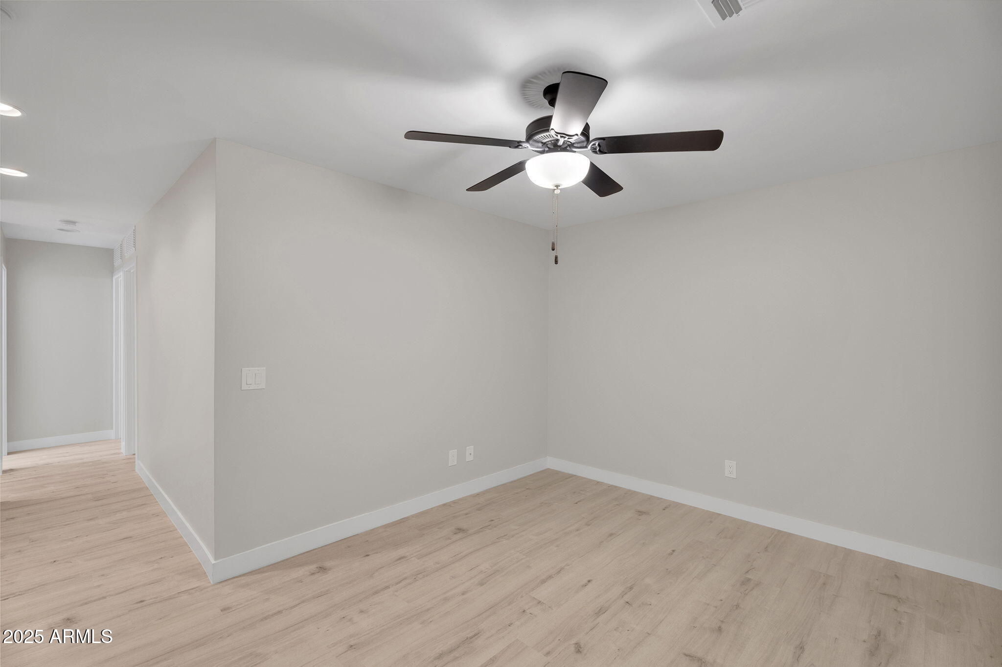 854 South San Marcos Drive, Unit 7C Apache Junction, AZ 85120 - Photo 17 of 48 a view of a room with wooden floor closet and windows