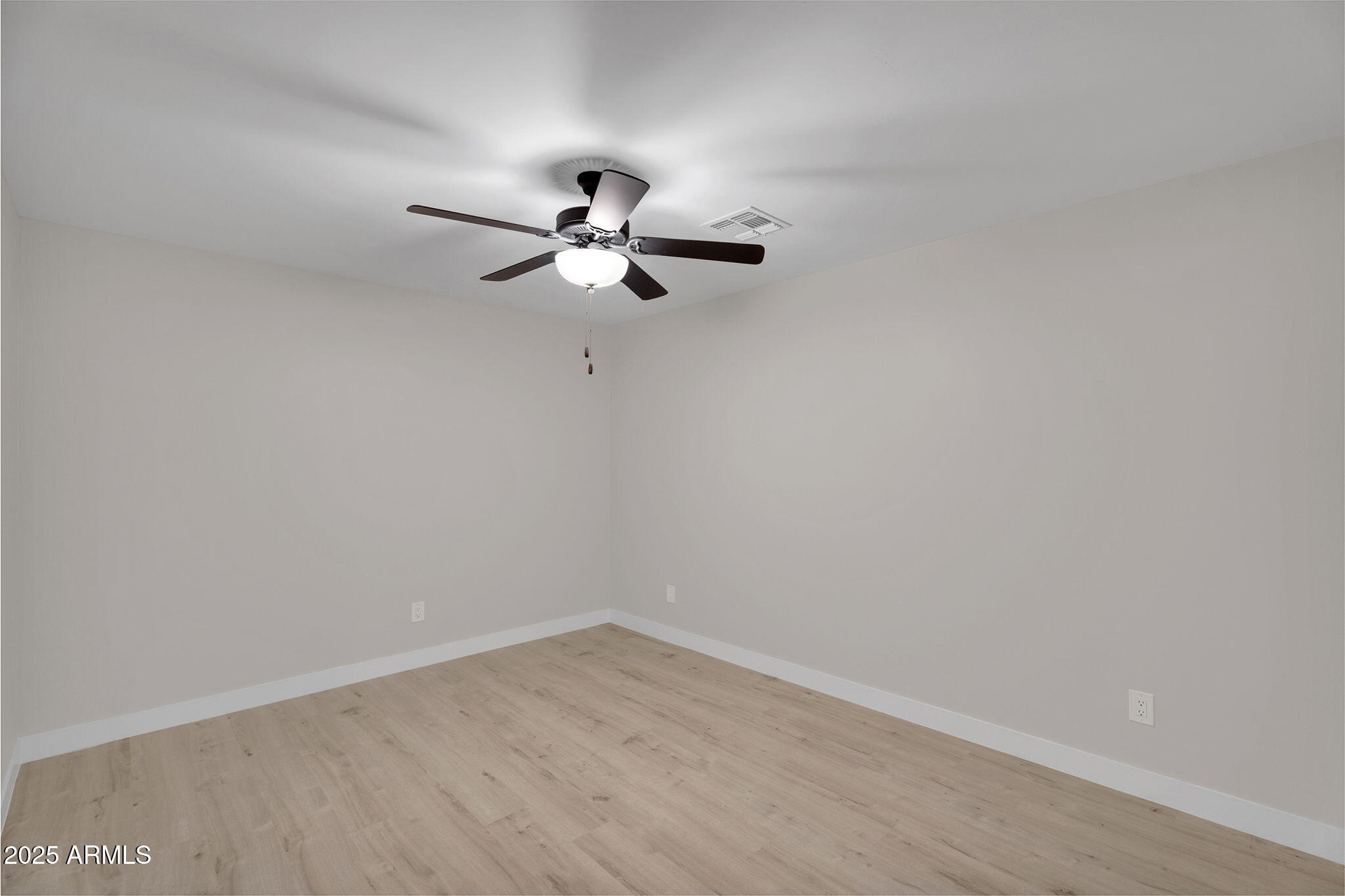 854 South San Marcos Drive, Unit 7C Apache Junction, AZ 85120 - Photo 18 of 48 wooden floor in an empty room