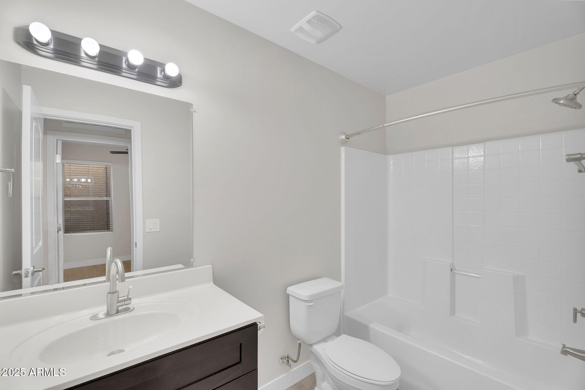 854 South San Marcos Drive, Unit 7C Apache Junction, AZ 85120 - Photo 24 of 48 a bathroom with a sink toilet and shower