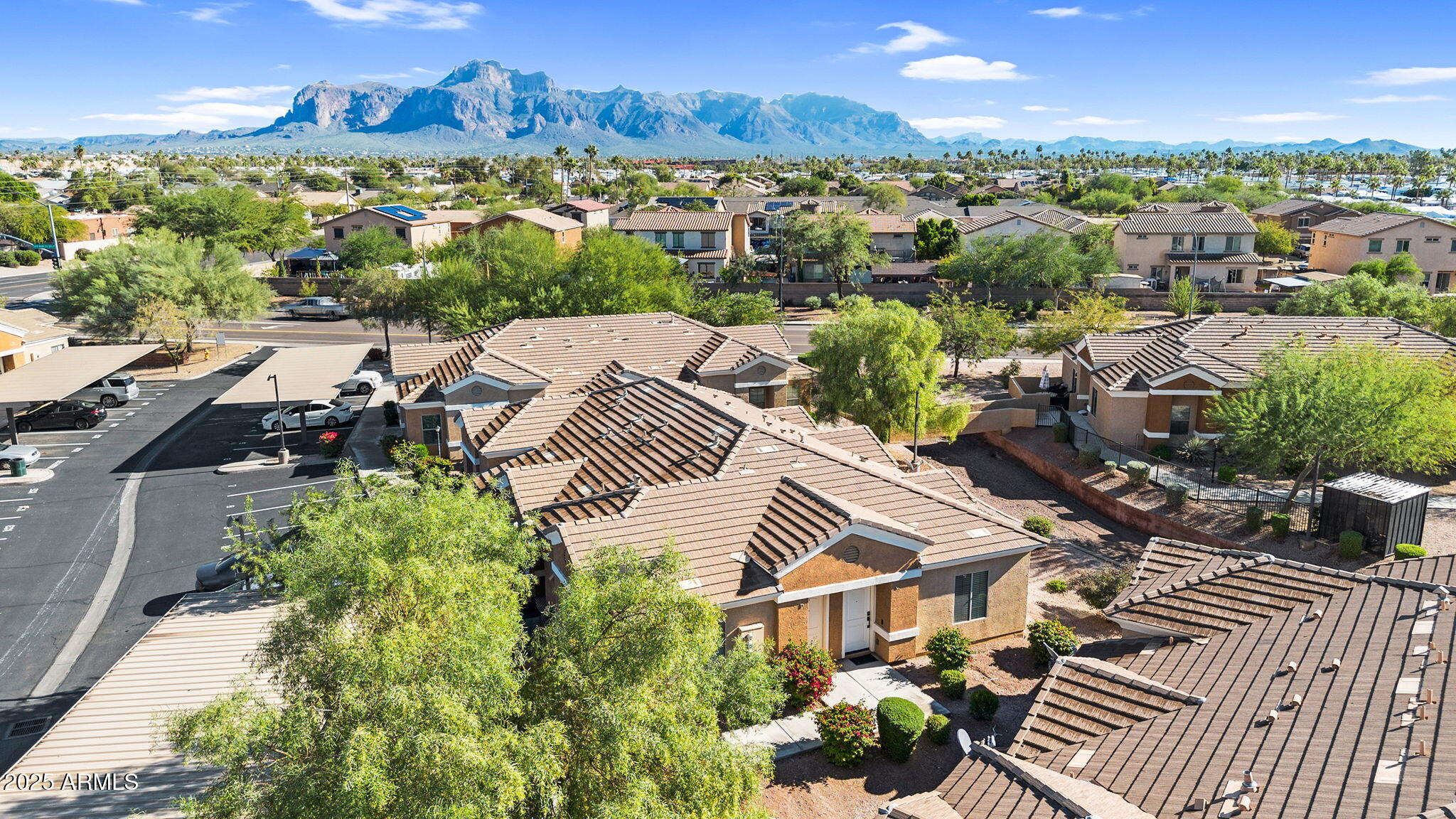 854 South San Marcos Drive, Unit 7C Apache Junction, AZ 85120 - Photo 27 of 48 an aerial view of a house with yard and green space