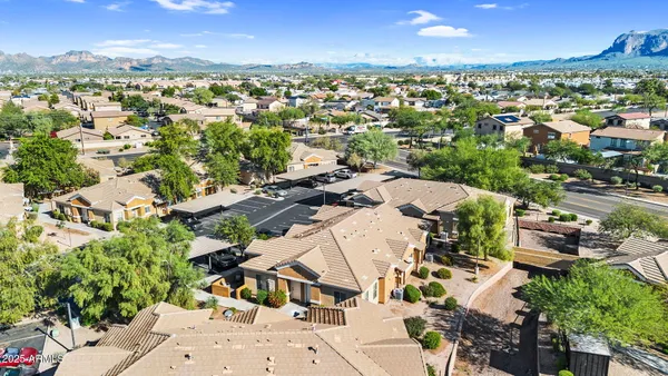 an aerial view of residential houses with outdoor space