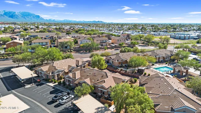 an aerial view of a city with lots of residential buildings