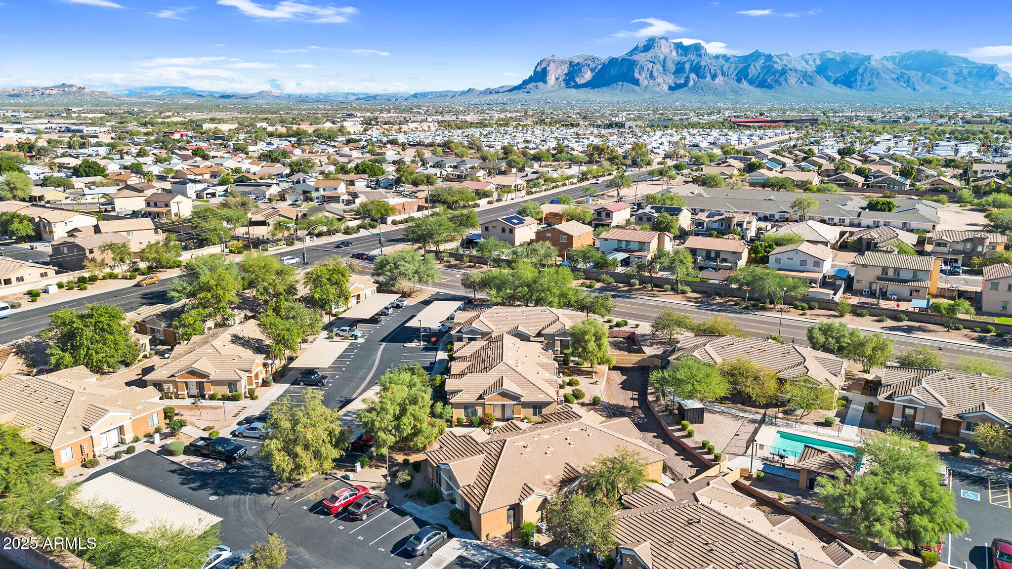 854 South San Marcos Drive, Unit 7C Apache Junction, AZ 85120 - Photo 41 of 48 an aerial view of residential houses with outdoor space