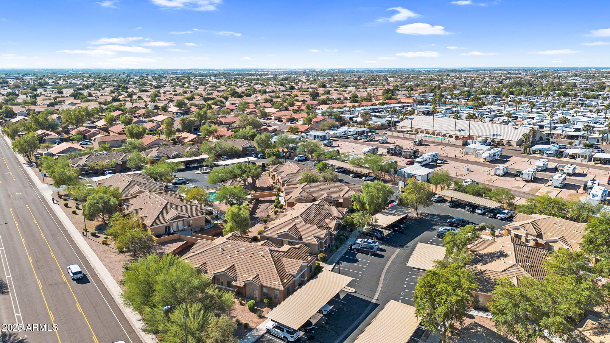 854 South San Marcos Drive, Unit 7C Apache Junction, AZ 85120 - Photo 44 of 48 an aerial view of residential houses with outdoor space