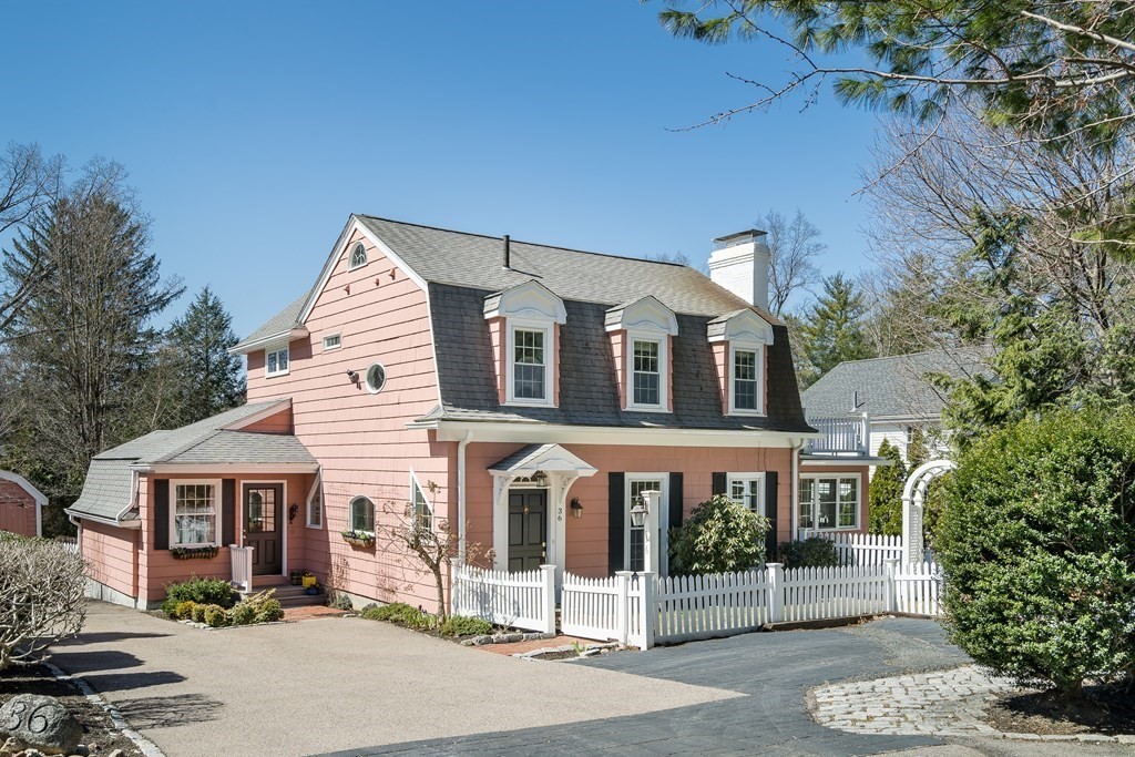 36 Sunset Road Wellesley, MA 02482 - Photo 1 of 30 a front view of a house with a porch