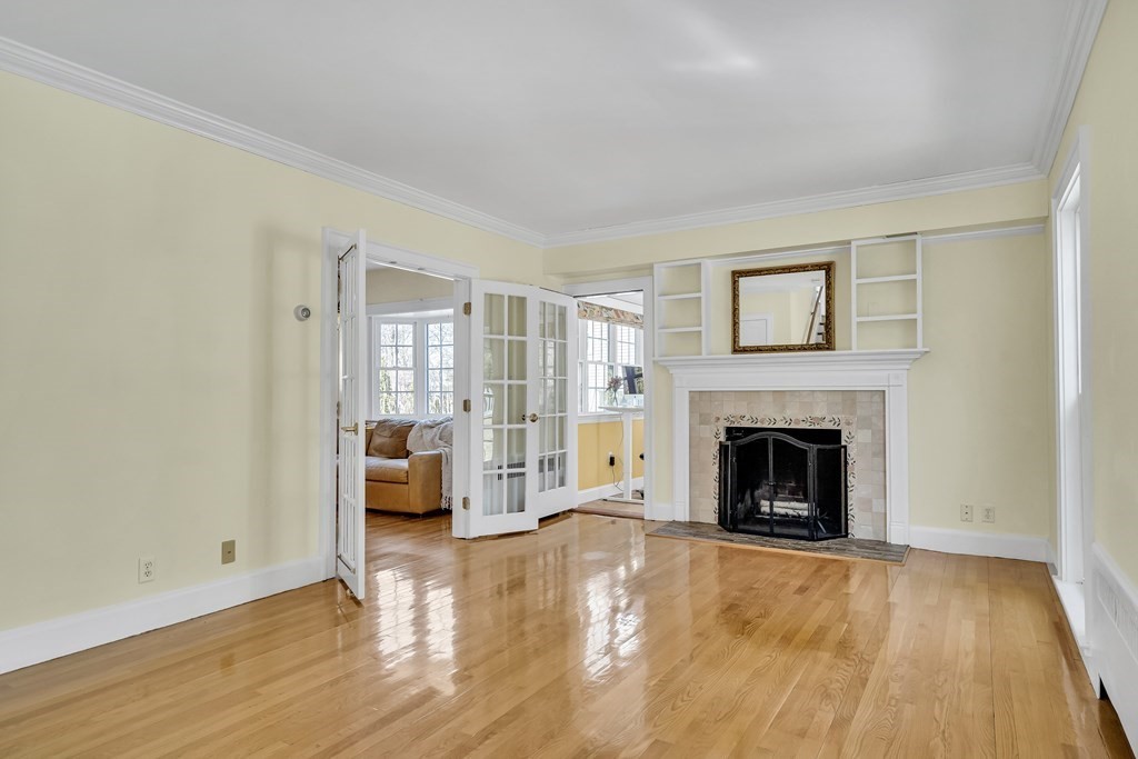 36 Sunset Road Wellesley, MA 02482 - Photo 12 of 30 a living room with furniture and a fireplace