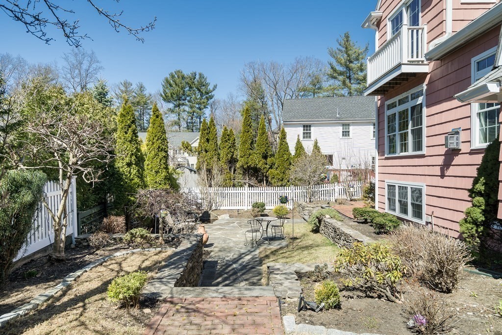 36 Sunset Road Wellesley, MA 02482 - Photo 30 of 30 a view of a house with a yard and sitting area