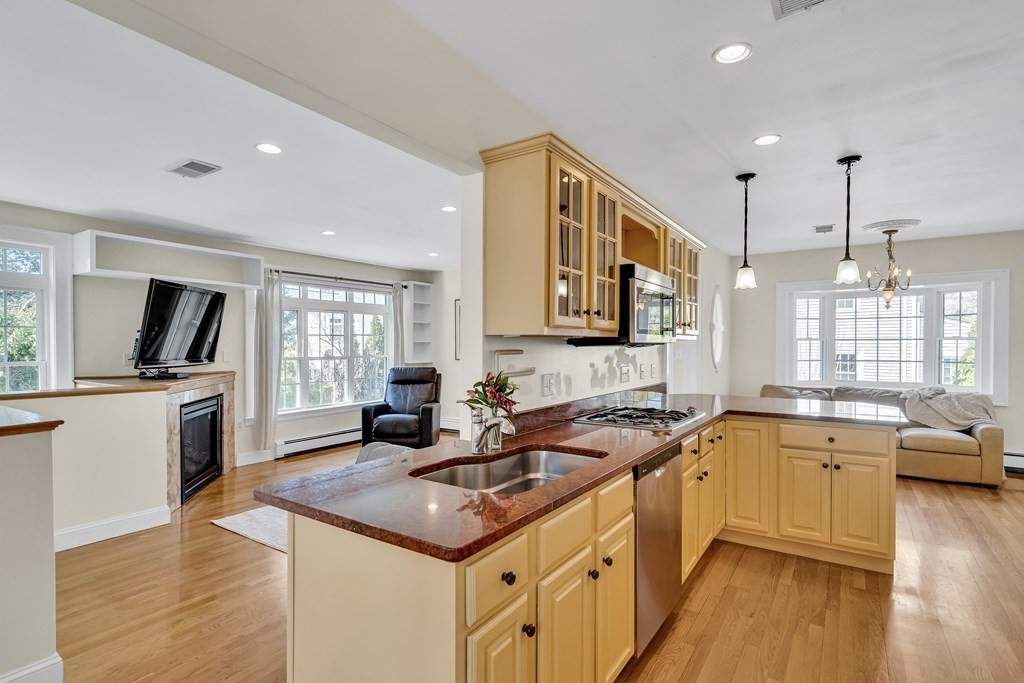 36 Sunset Road Wellesley, MA 02482 - Photo 8 of 30 a kitchen with a sink stove top oven and microwave