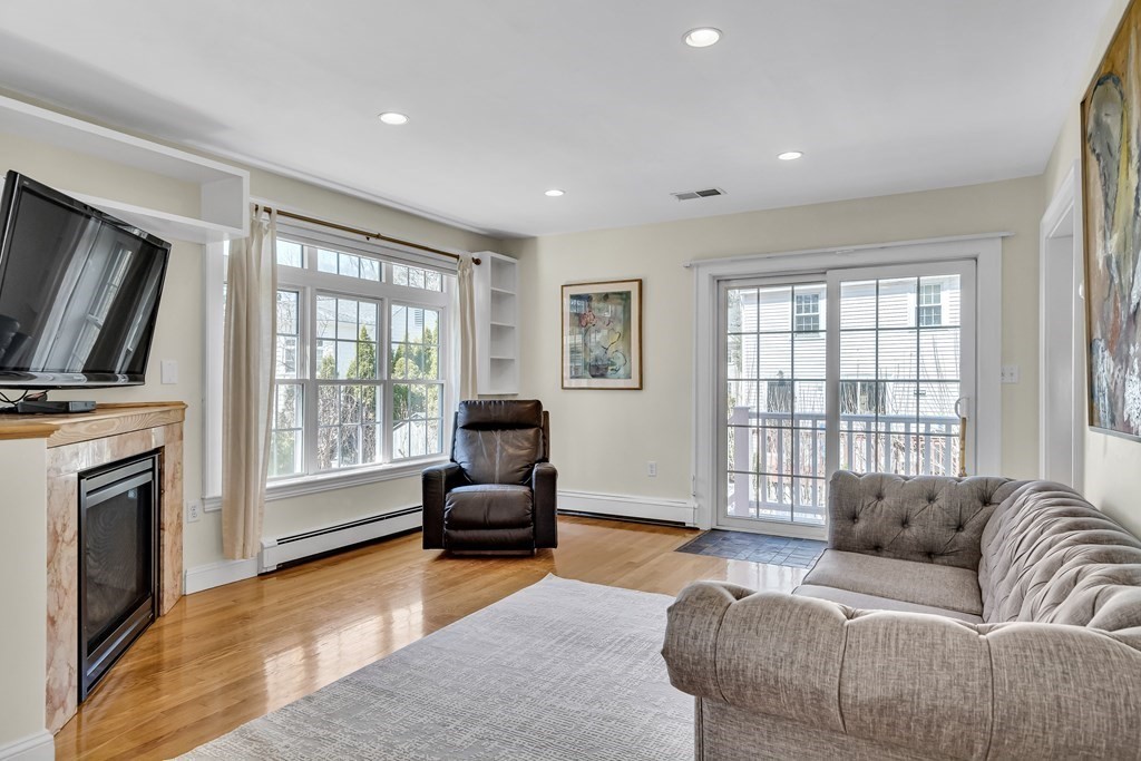 36 Sunset Road Wellesley, MA 02482 - Photo 10 of 30 a living room with furniture and a flat screen tv