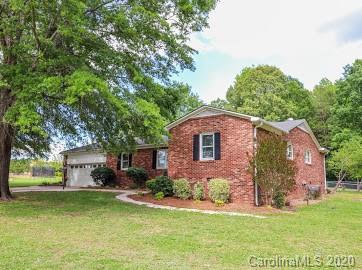 377 Stone Road Salisbury, NC 28146 - Photo 1 of 25 a front view of a house with a garden