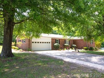 377 Stone Road Salisbury, NC 28146 - Photo 2 of 25 a front view of a house with a yard and tree