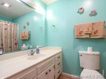 377 Stone Road Salisbury, NC 28146 - Photo 16 of 25 a bathroom with a toilet a sink and mirror