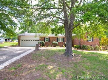 377 Stone Road Salisbury, NC 28146 - Photo 3 of 25 a view of a house with backyard and a tree