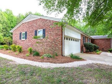 377 Stone Road Salisbury, NC 28146 - Photo 4 of 25 a front view of a house with a yard and garage