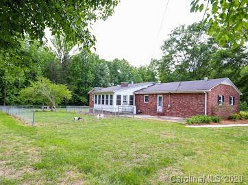 377 Stone Road Salisbury, NC 28146 - Photo 5 of 25 a view of a house with a big yard plants and large trees