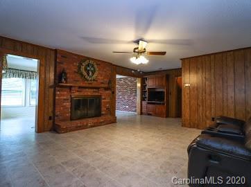 377 Stone Road Salisbury, NC 28146 - Photo 8 of 25 a view of an empty room with a fireplace