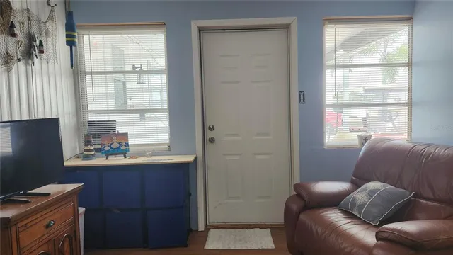 a room with furniture and windows