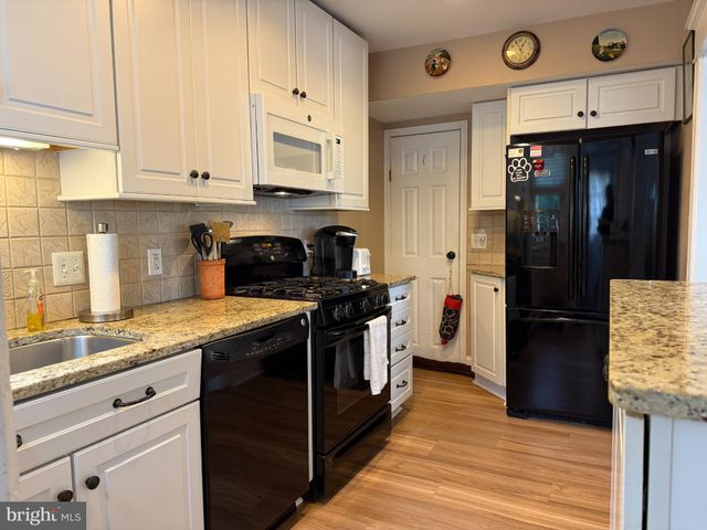 a bed room with furniture and a window