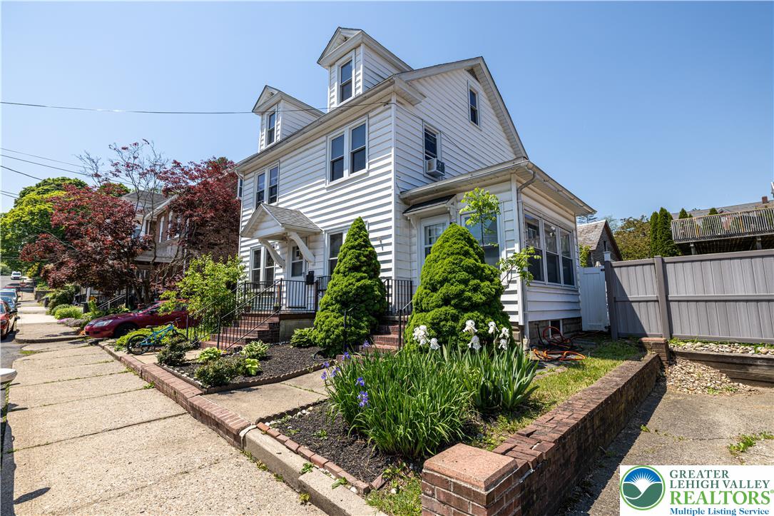 118 South 3rd Street Bangor, PA 18013 - Photo 2 of 33 This charming home features classic white siding and a welcoming front entrance.