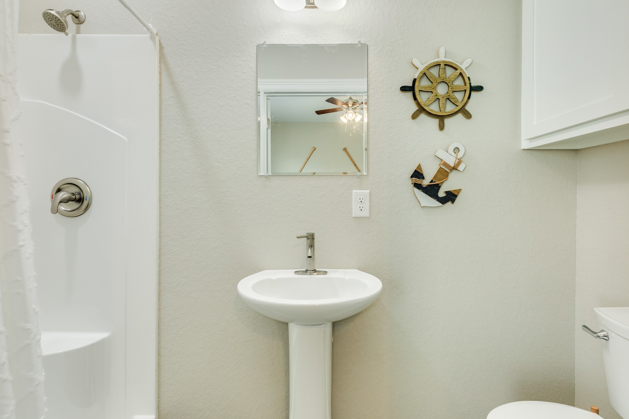 524 Thunder Road Surfside Beach, TX 77541 - Photo 21 of 26 Bath with shower an pedestal sink