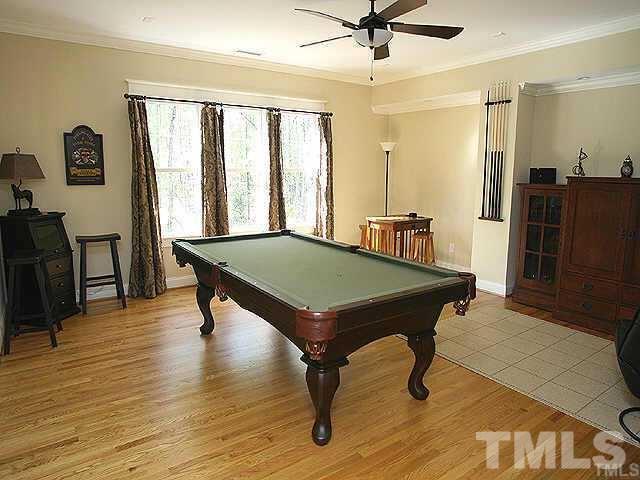 4214 Batiste Road Raleigh, NC 27613 - Photo 20 of 25 a room with pool table and windows
