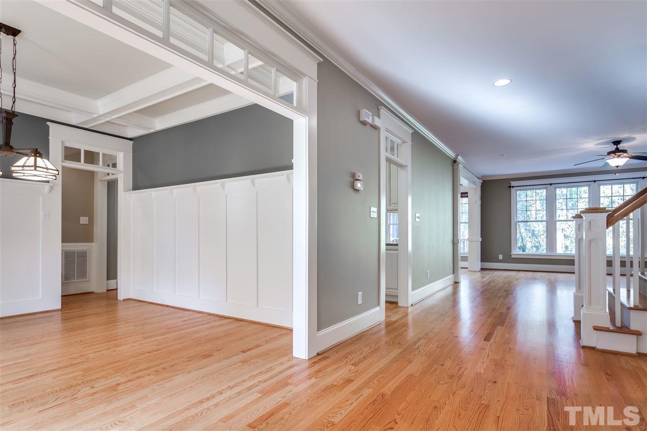 4214 Batiste Road Raleigh, NC 27613 - Photo 7 of 25 a view of empty room with wooden floor