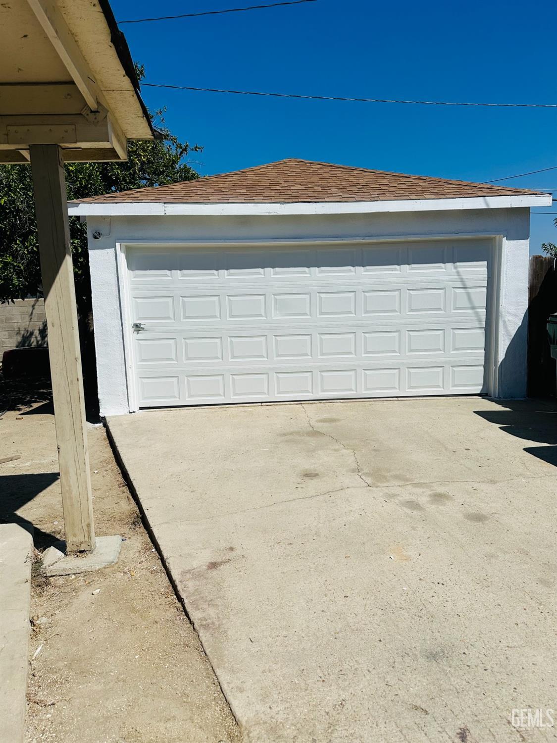 Undisclosed Address Delano, CA 93215 - Photo 18 of 20 a view of backyard with garage