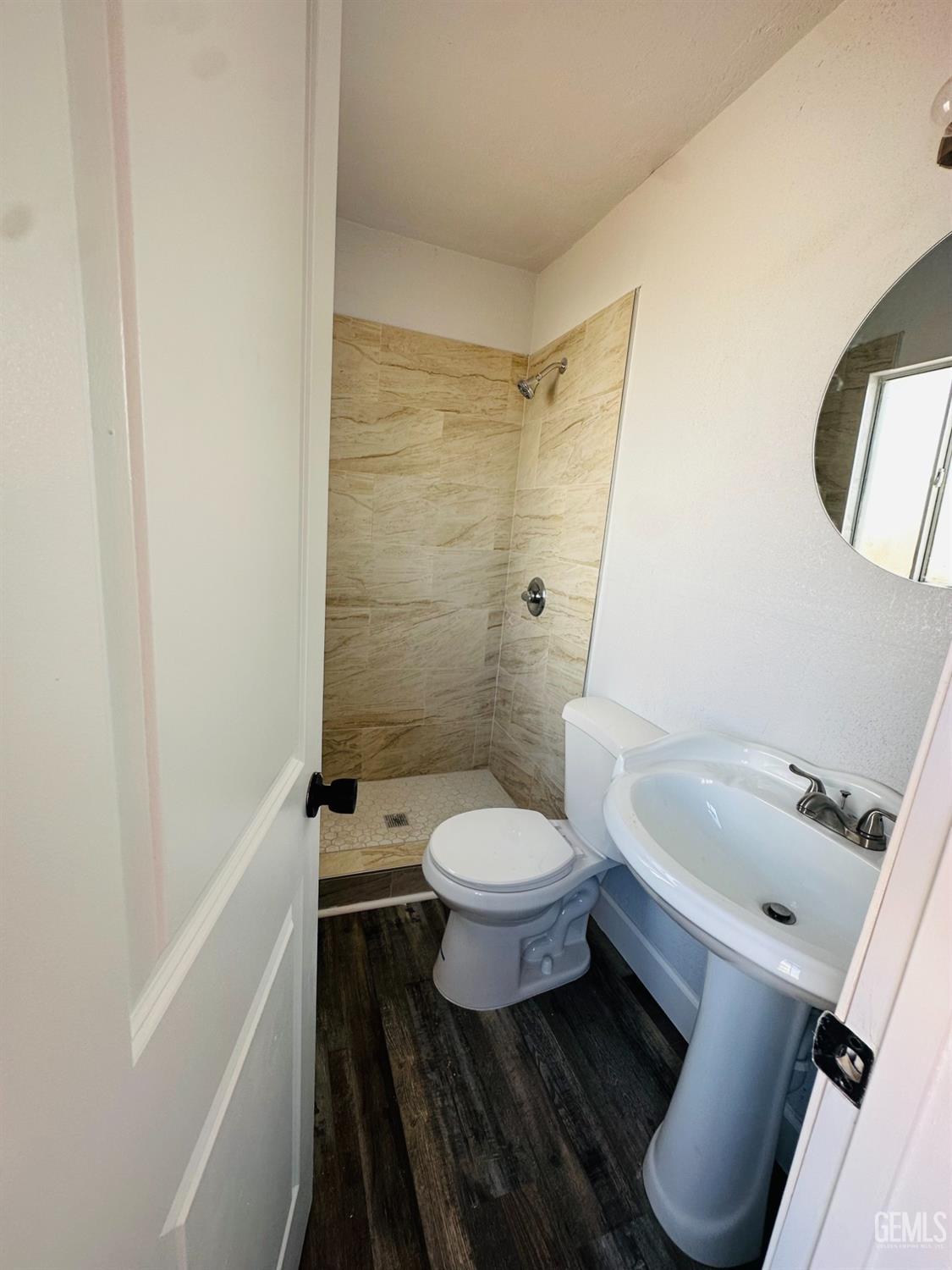 Undisclosed Address Delano, CA 93215 - Photo 7 of 20 a bathroom with a toilet and a shower