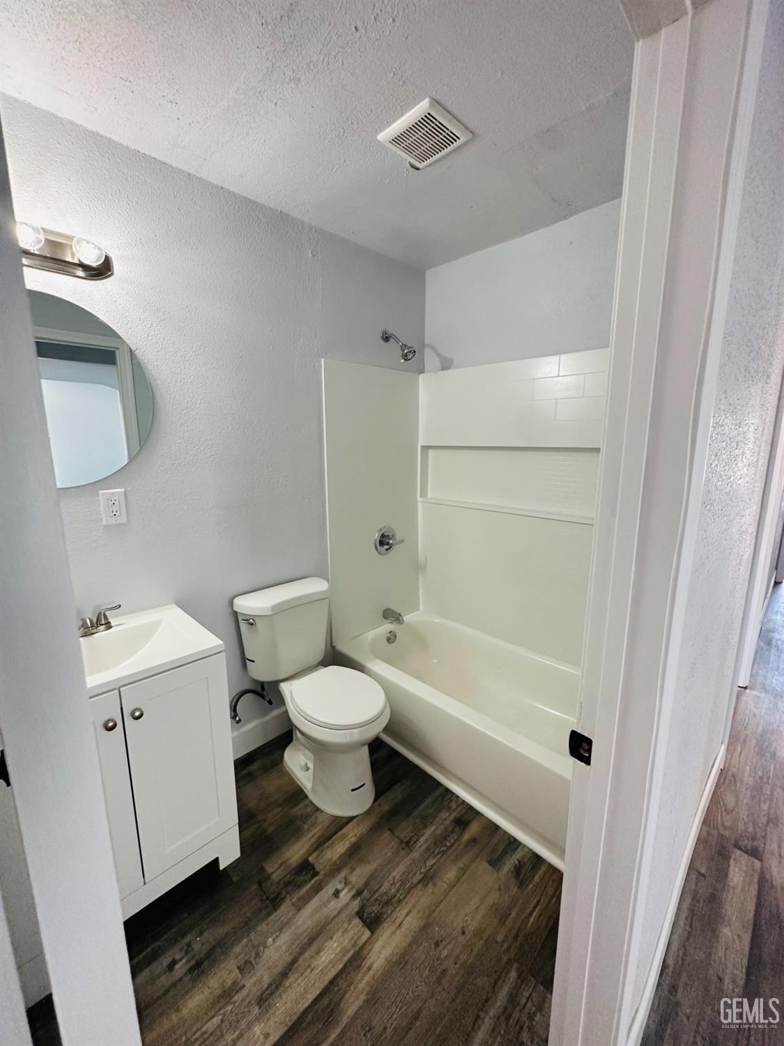 Undisclosed Address Delano, CA 93215 - Photo 9 of 20 a bathroom with a toilet and a shower