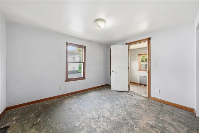 an empty room with windows