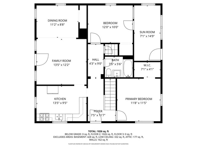 a picture of floor with a white wall and a painting