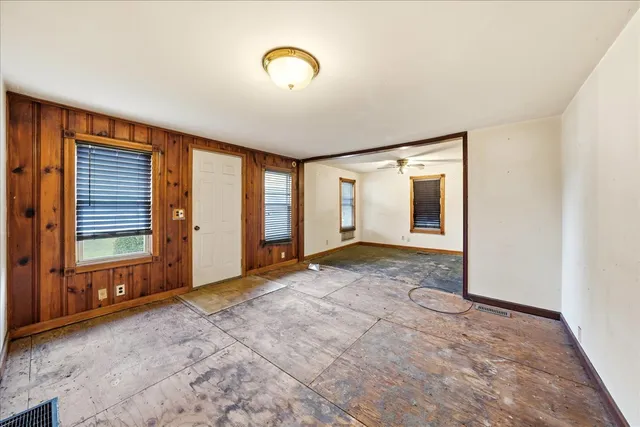 an empty room with windows