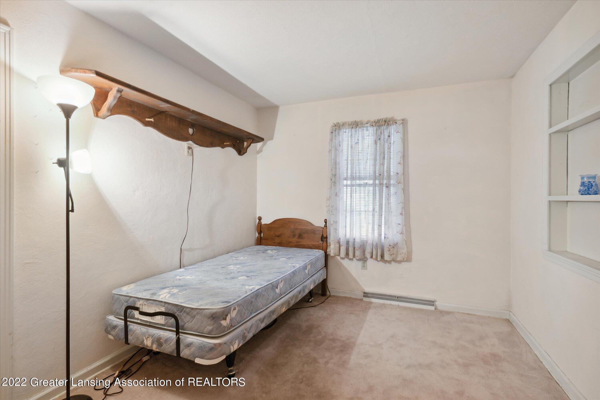 5897 Lansing Road Potterville, MI 48876 - Photo 29 of 34 25-5897-Lansing-Rd-WindowStill-21