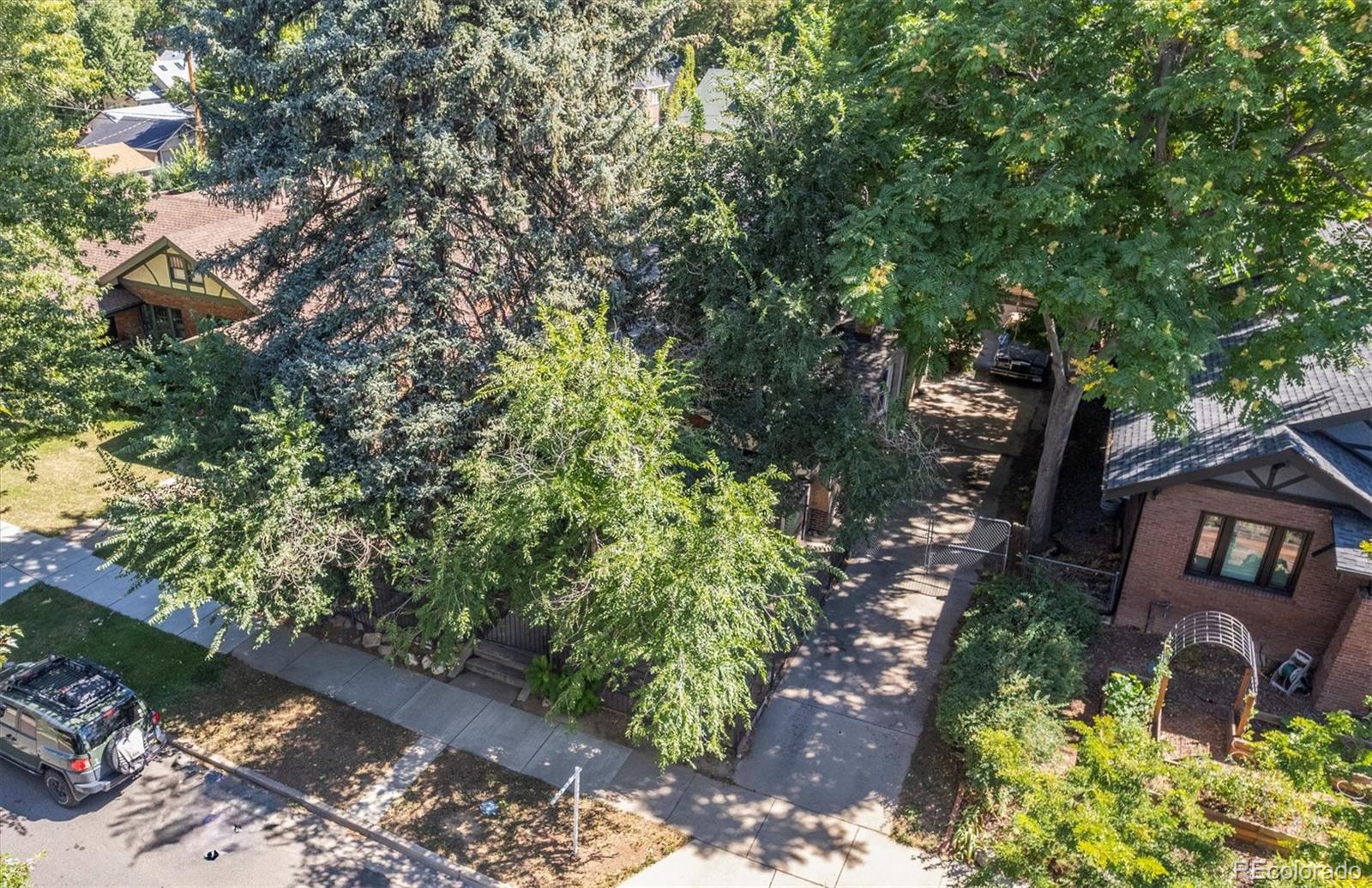 2510 Cherry Street Denver, CO 80207 - Photo 39 of 45 a backyard of a house with lots of green space