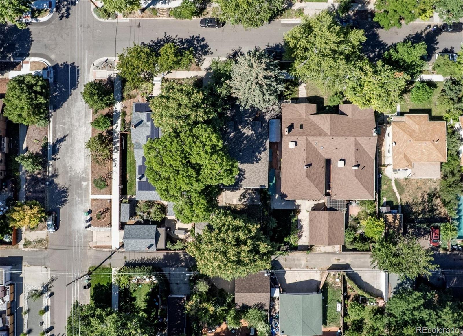 2510 Cherry Street Denver, CO 80207 - Photo 8 of 45 an aerial view of a house with a yard and garden
