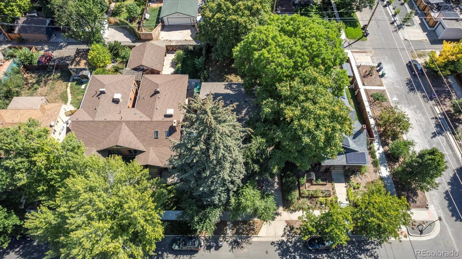 2510 Cherry Street Denver, CO 80207 - Photo 9 of 45 an aerial view of residential house with outdoor space and trees all around