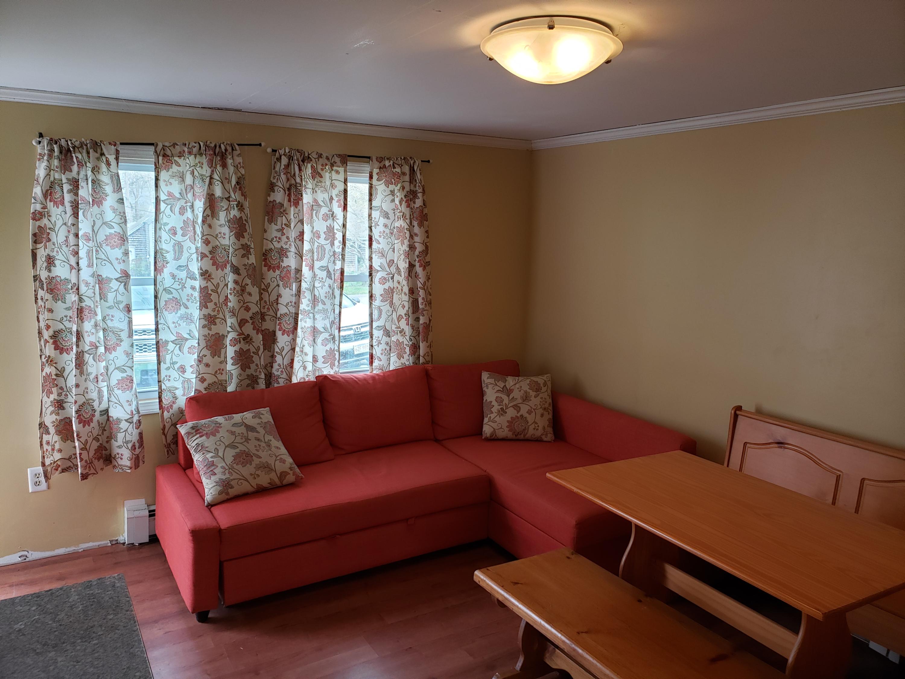 10 Childs Homestead Road Orleans, MA 02653 - Photo 15 of 23 a living room with furniture and a window
