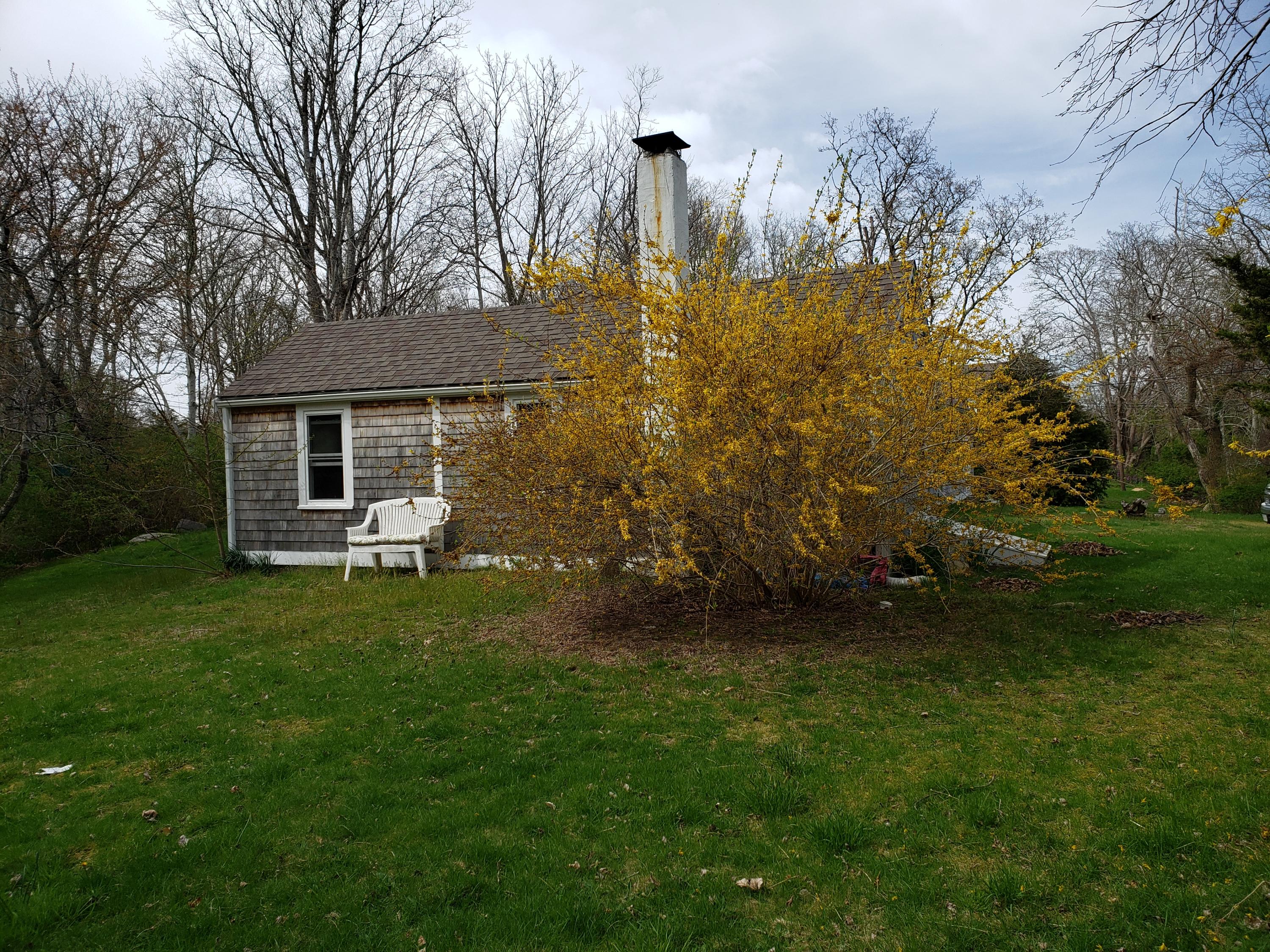 10 Childs Homestead Road Orleans, MA 02653 - Photo 23 of 23 a view of a house with a backyard
