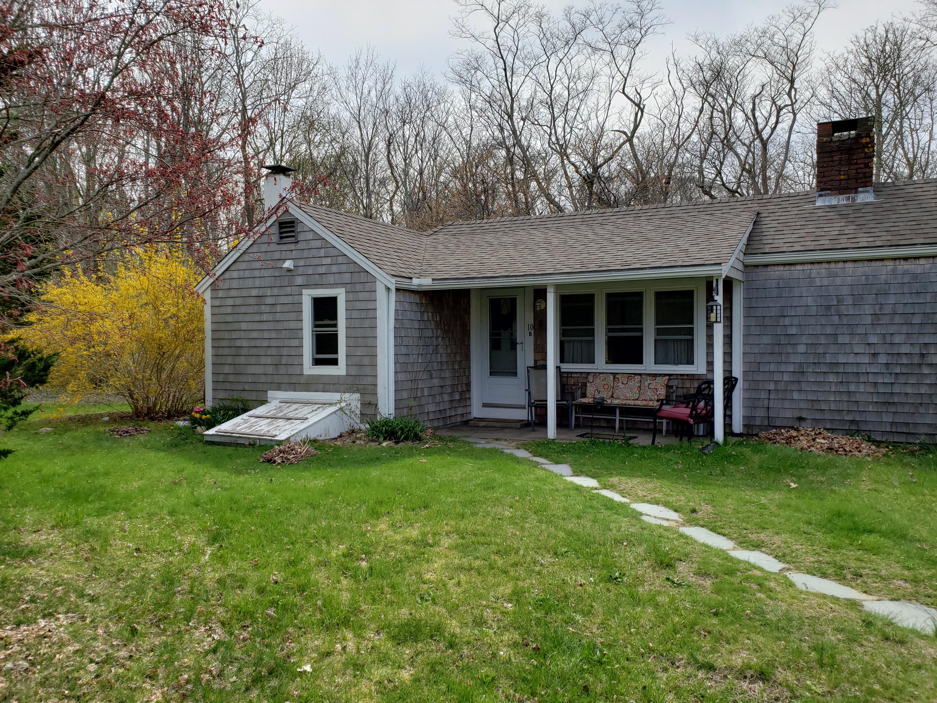 10 Childs Homestead Road Orleans, MA 02653 - Photo 3 of 23 a view of a house with a backyard and sitting area