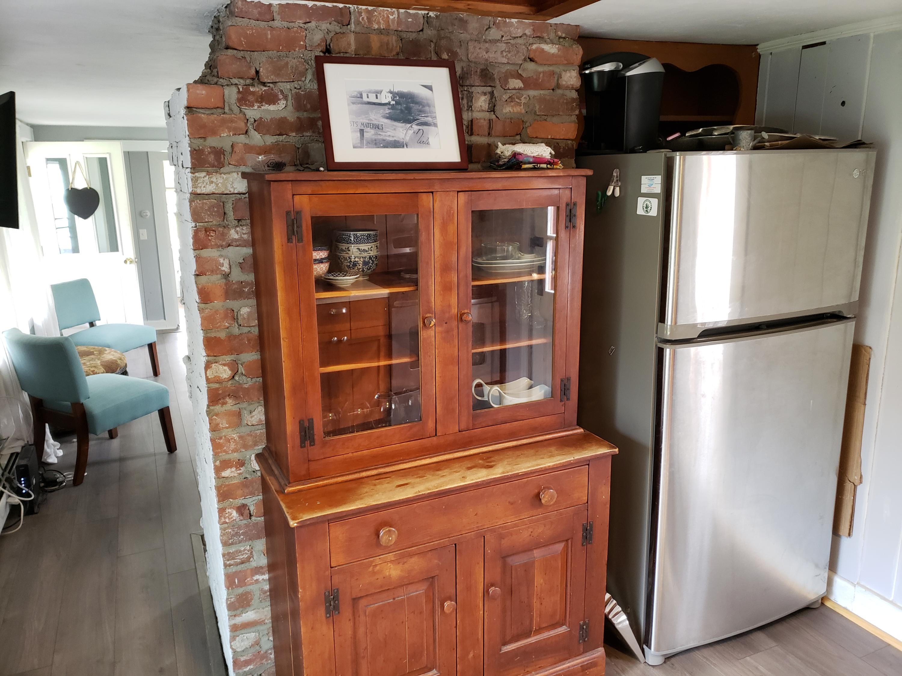 10 Childs Homestead Road Orleans, MA 02653 - Photo 8 of 23 a view of a kitchen with fridge and workspace