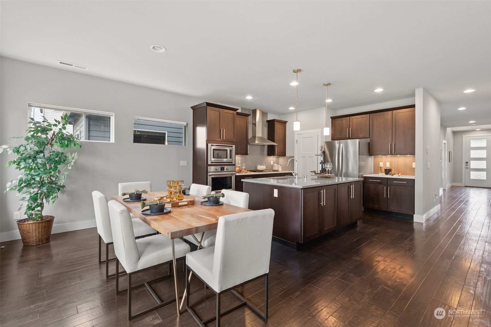 14 176th Place Southeast Bothell, WA 98012 - Photo 8 of 30 a kitchen with a table and chairs in it