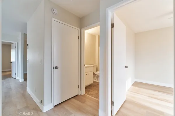 a view of a bathroom with toilet front door