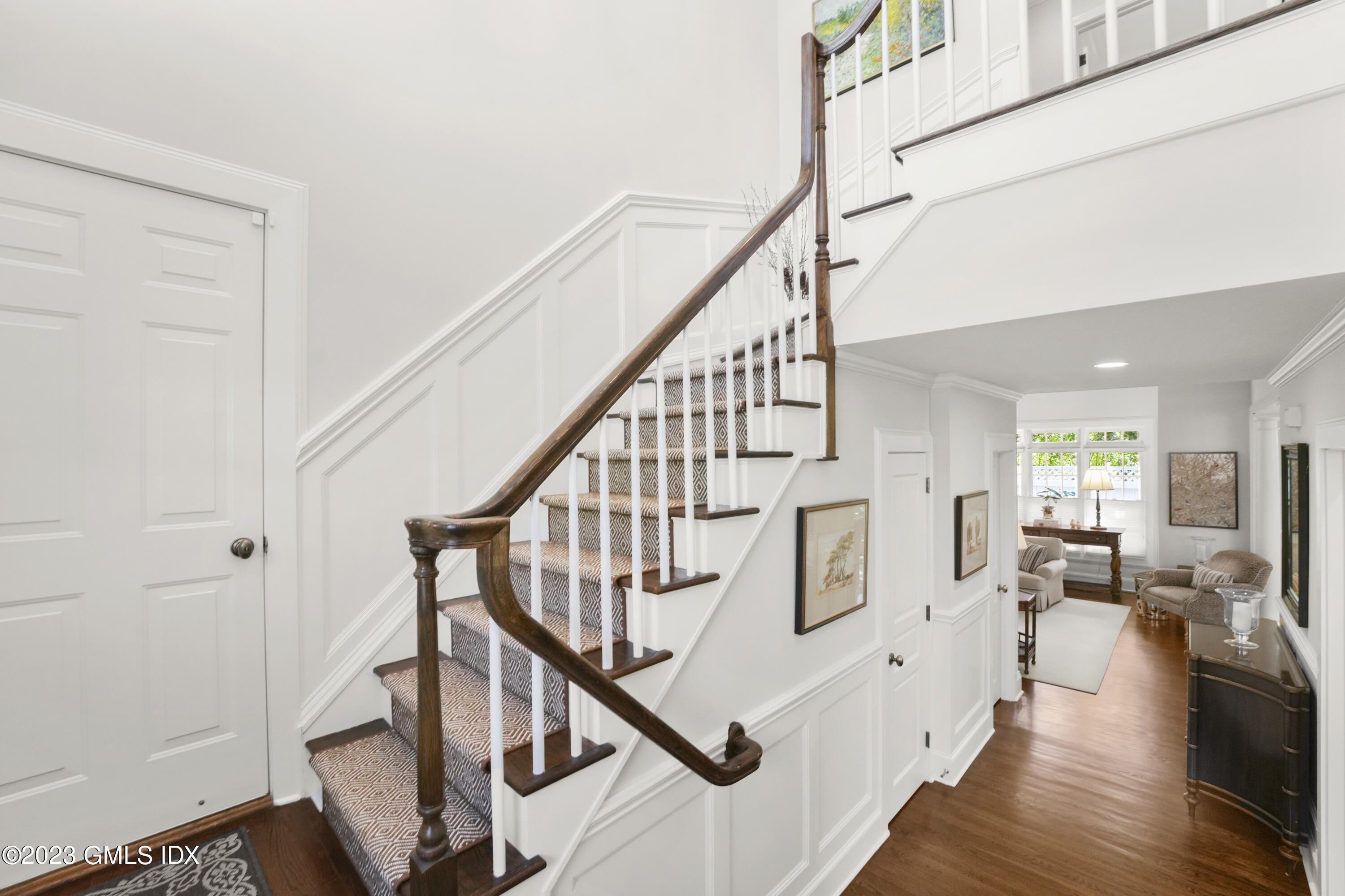 48 Spring Street, Unit 14 Greenwich, CT 06830 - Photo 13 of 29 a view of entryway and hall with wooden floor