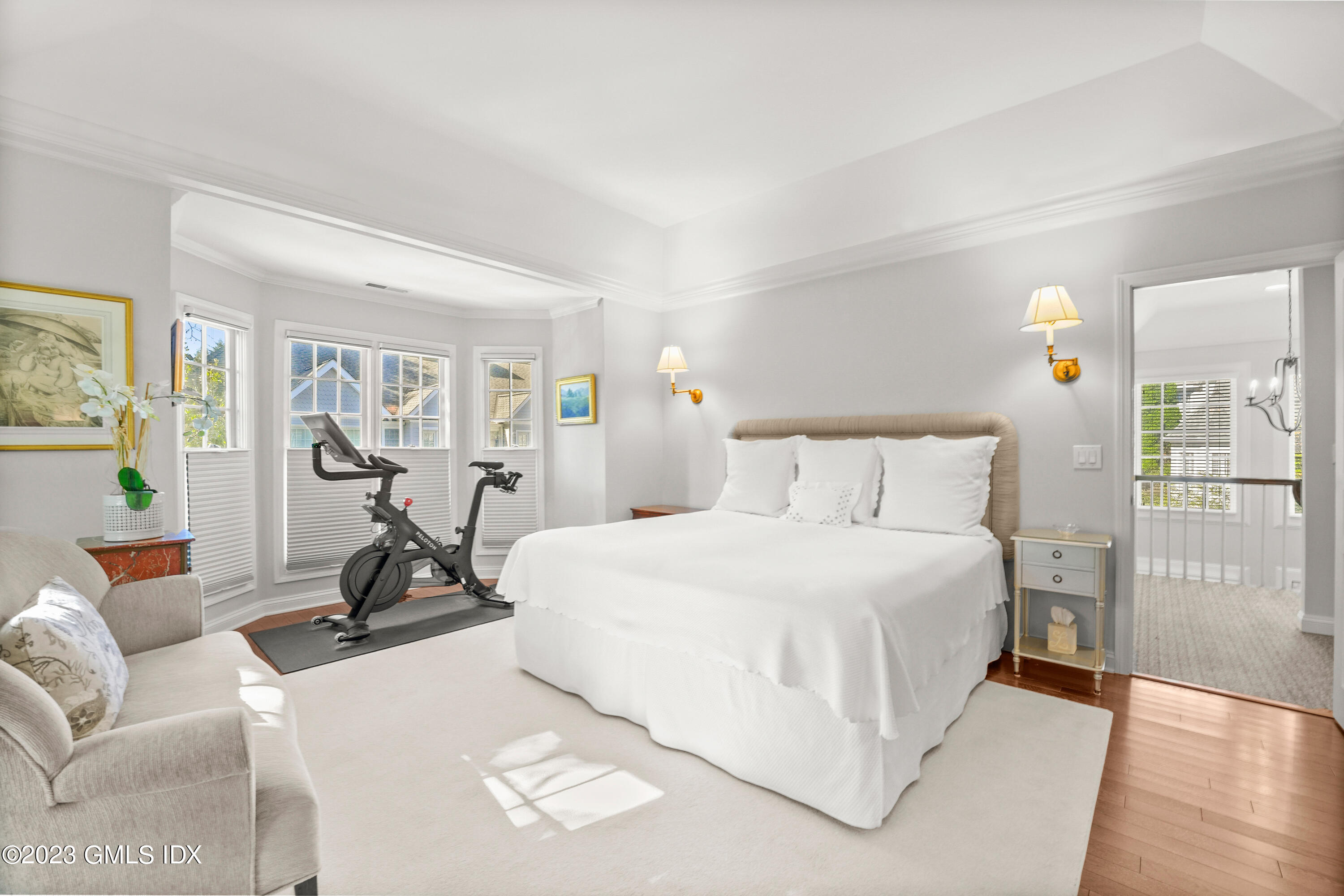 48 Spring Street, Unit 14 Greenwich, CT 06830 - Photo 14 of 29 a bed room with a bed and a view of living room