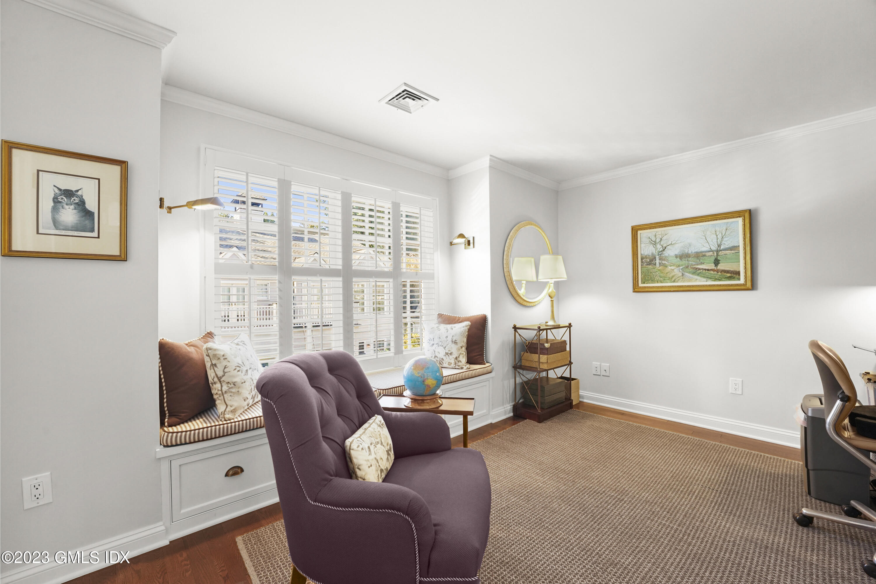 48 Spring Street, Unit 14 Greenwich, CT 06830 - Photo 20 of 29 a living room with furniture a flat screen tv and a window